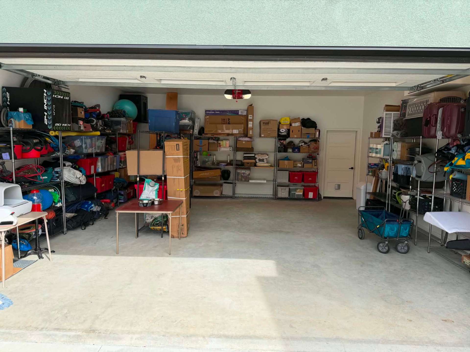 After photo, Two car garage cleanout and shelving in East Wenatchee, WA