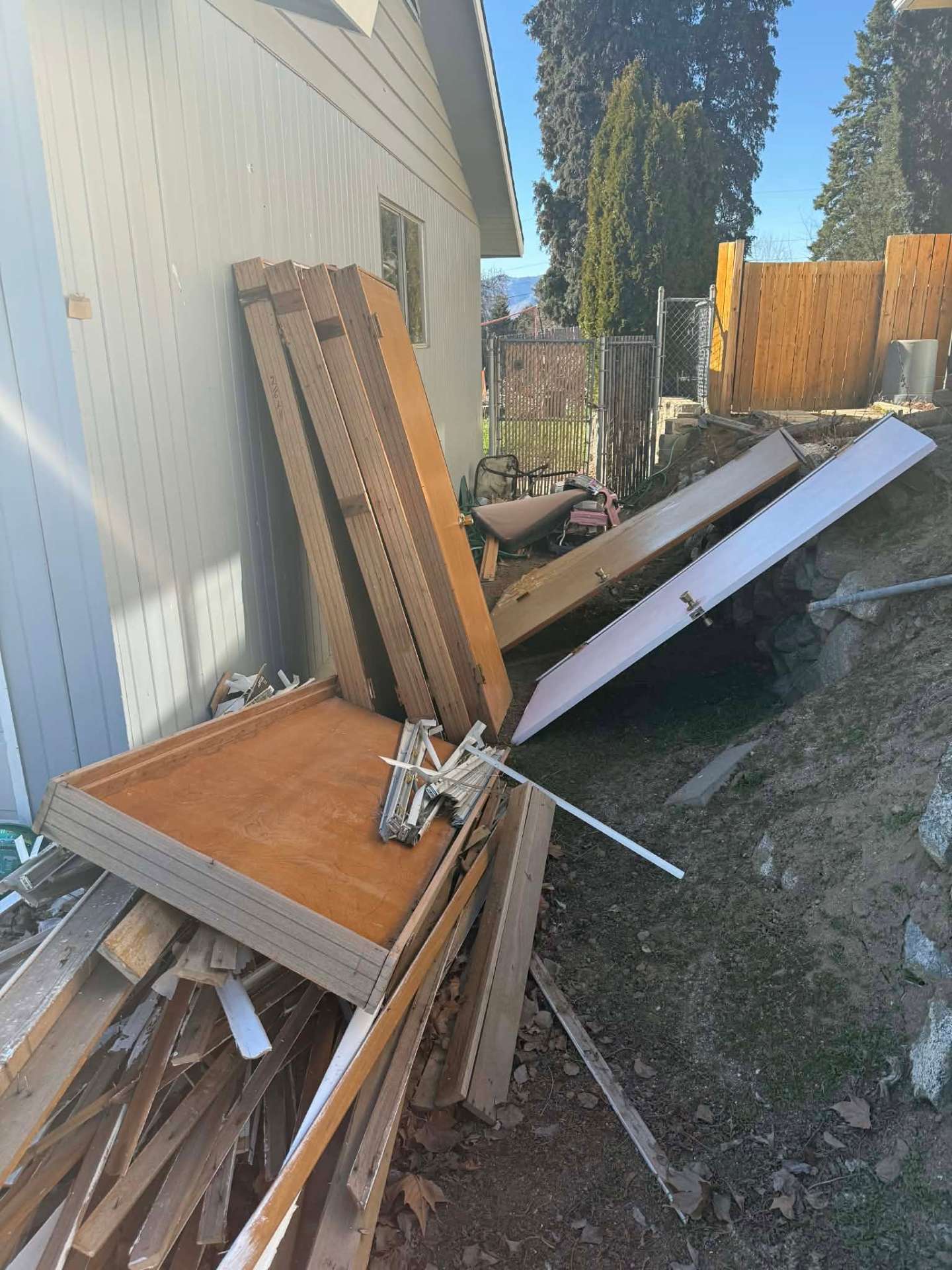 Before photo, Property cleanup and full debris removal in the Wenatchee Valley