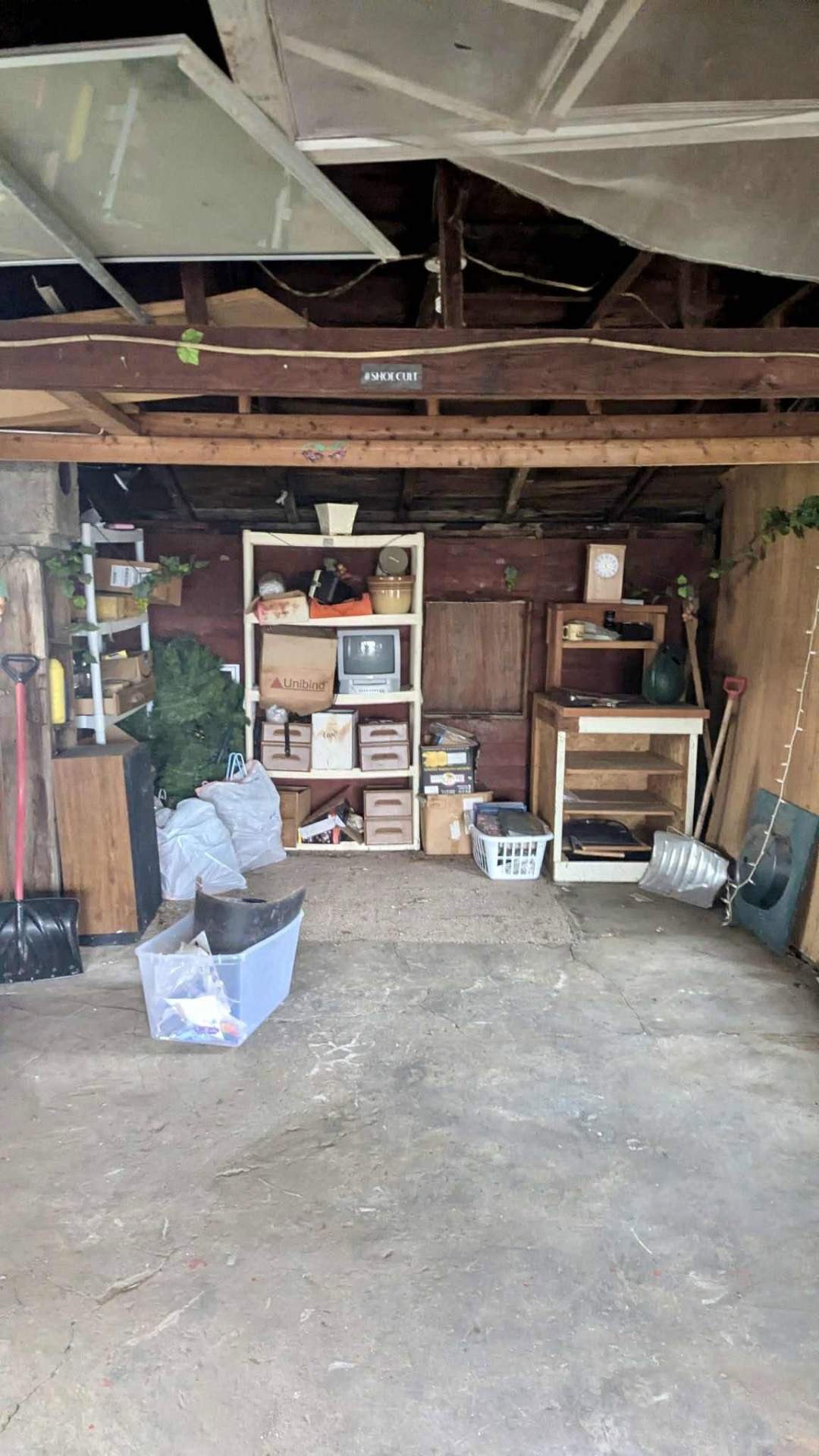 After photo, Shelving reset and debris removal, Wenatchee Valley barn project